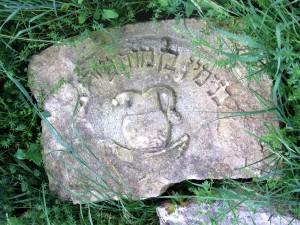 Another of the headstones recovered from the garden and courtyard